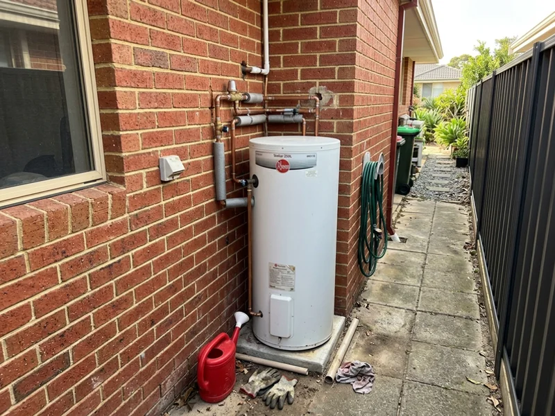 New electric storage tank installed in a side setback